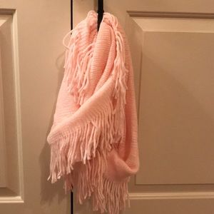 I’m selling a pink scarf that is very soft!